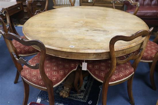 A mid Victorian mahogany circular topped breakfast table, W.130cm